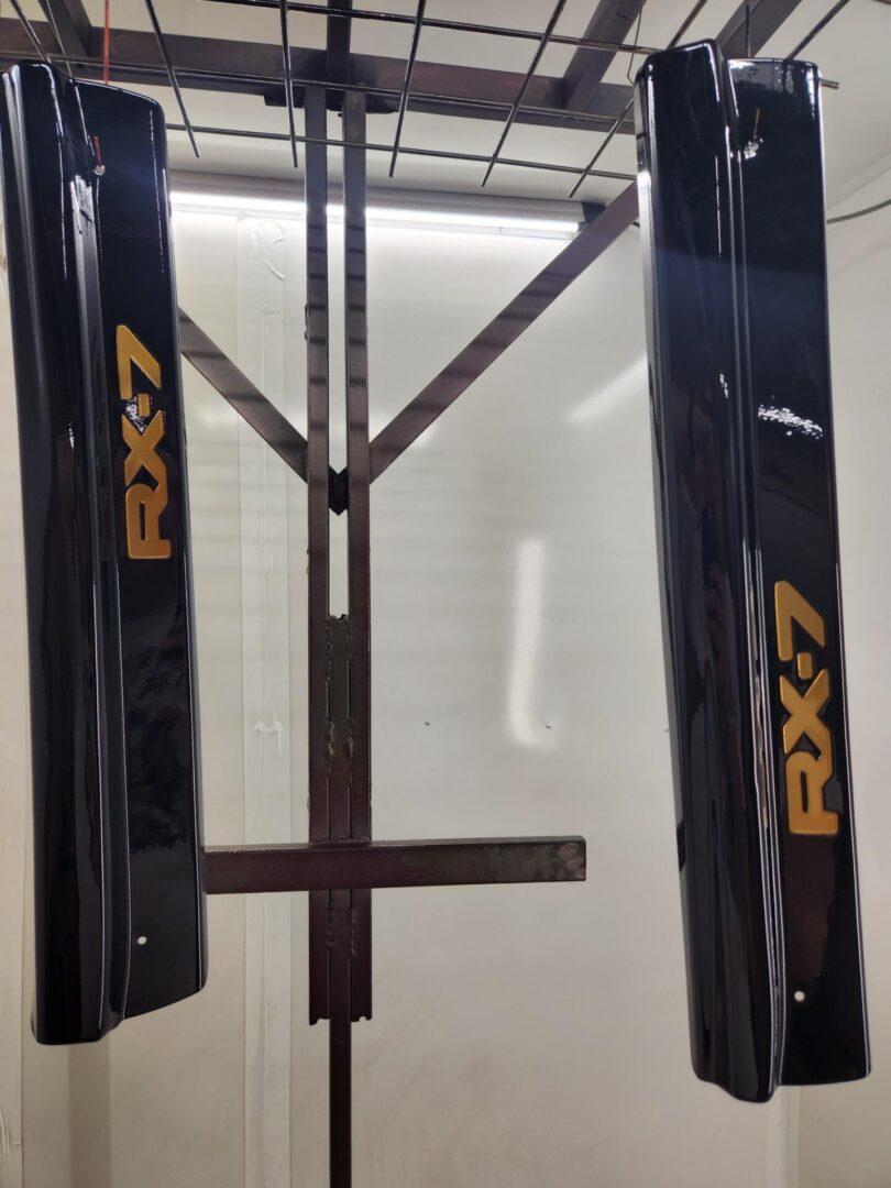 A black and yellow door with two bars on it