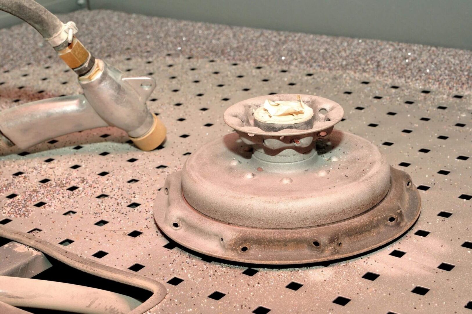 A gas burner sitting on top of a table.